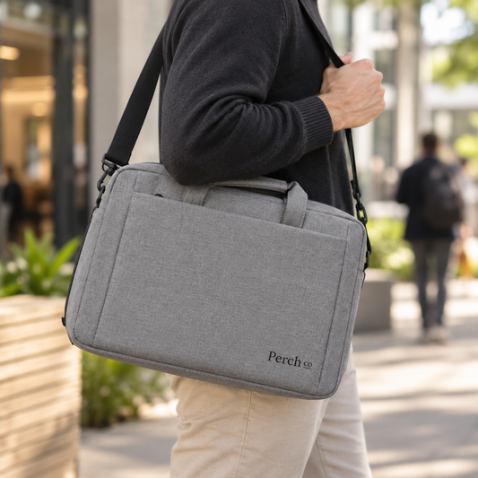 Minimal laptop shoulder bag carried over the shoulder