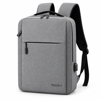 Grey minimalist laptop backpack with front zip pocket, USB port and printed logo