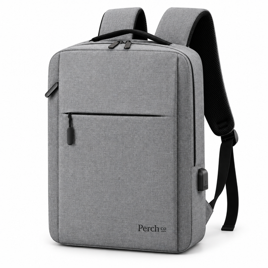 Grey minimalist laptop backpack with front zip pocket, USB port and printed logo