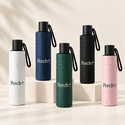 Compact folding umbrellas in white, navy, forest green, black and pink