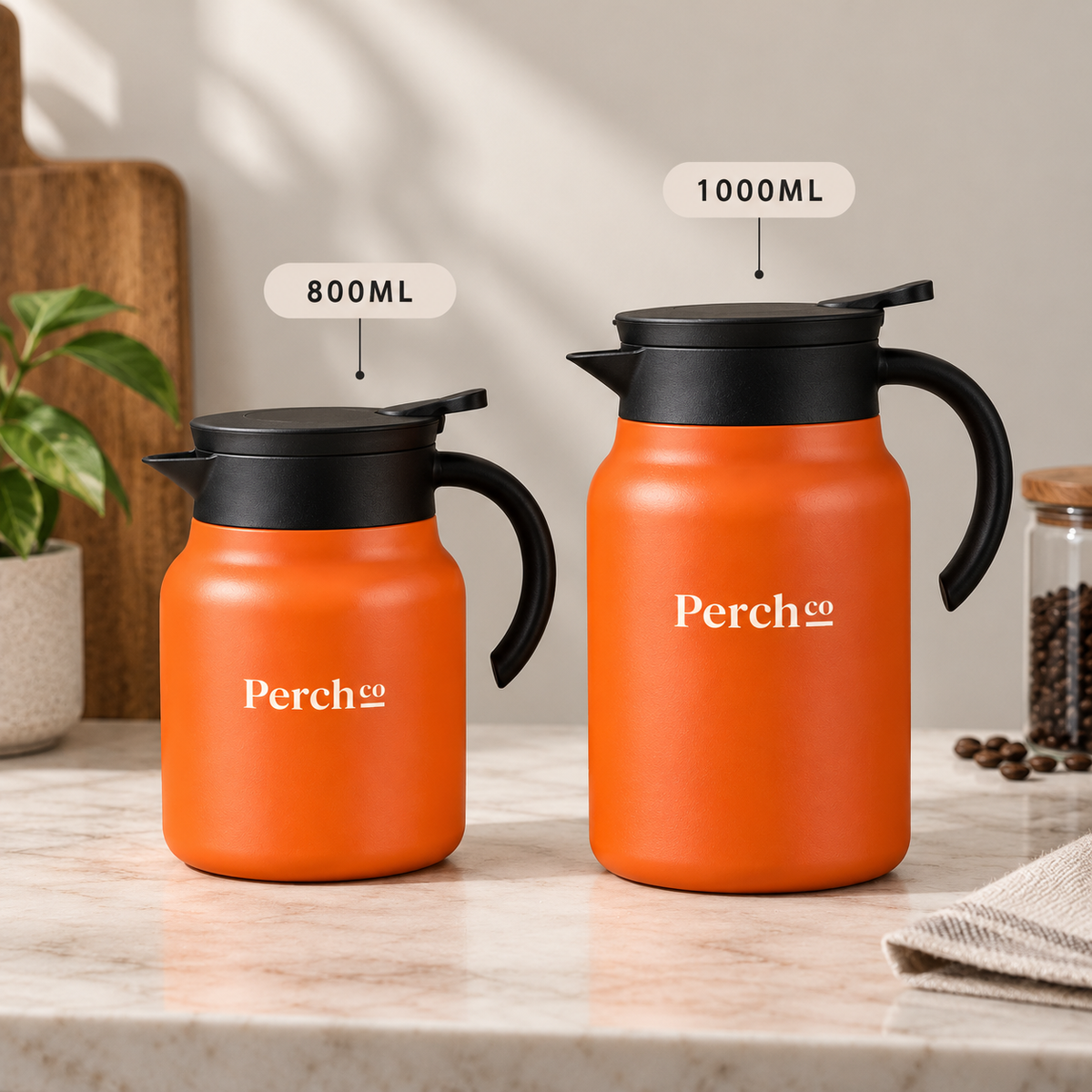 Insulated tea pot in orange shown in both 800 ml and 1000 ml sizes, branded with the Perch Co logo