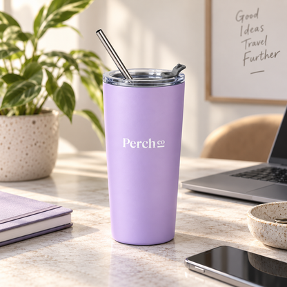 Perch Co branded 600ml straw tumbler in purple on a desk beside a laptop and notebook