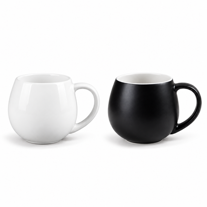 Ceramic bulb mugs in gloss white and matte black, branded with the Perch Co logo
