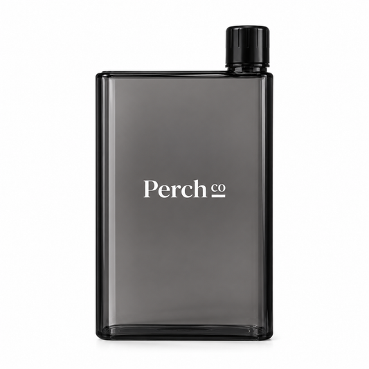 Perch Co branded A5 flat bottle in smoke grey with a black corner screw cap