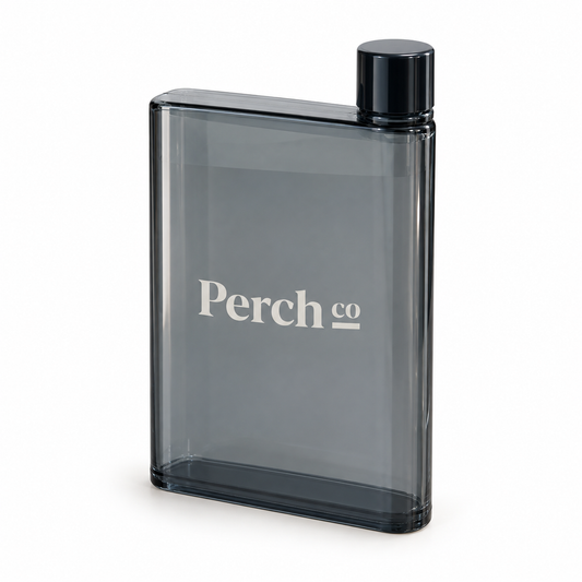 Perch Co branded A5 flat bottle in smoke grey with a black corner screw cap