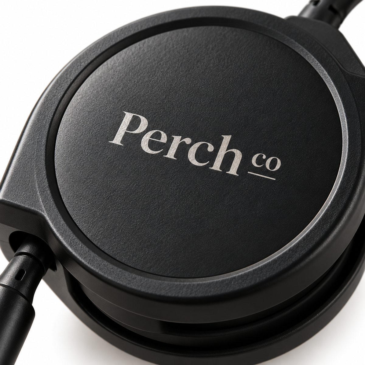 Close-up of the printed logo on the black charging cable housing